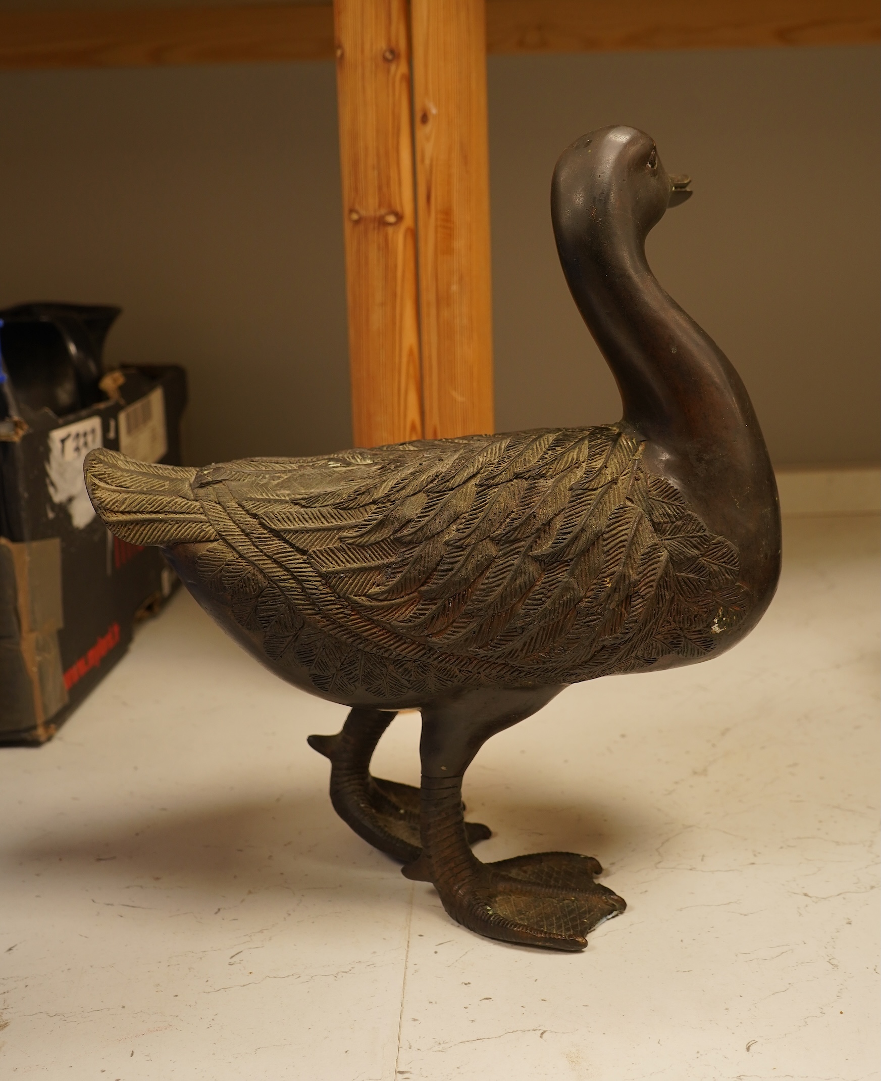 A bronze study of a duck, 30cm high
